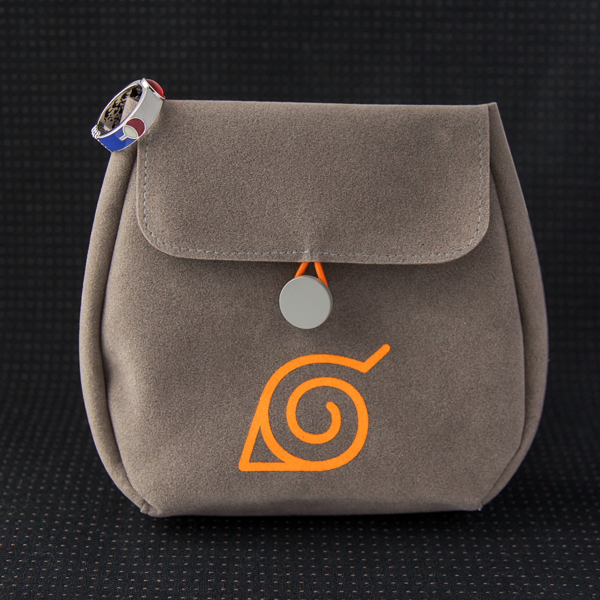 Promotional display featuring the ring alongside official packaging elements