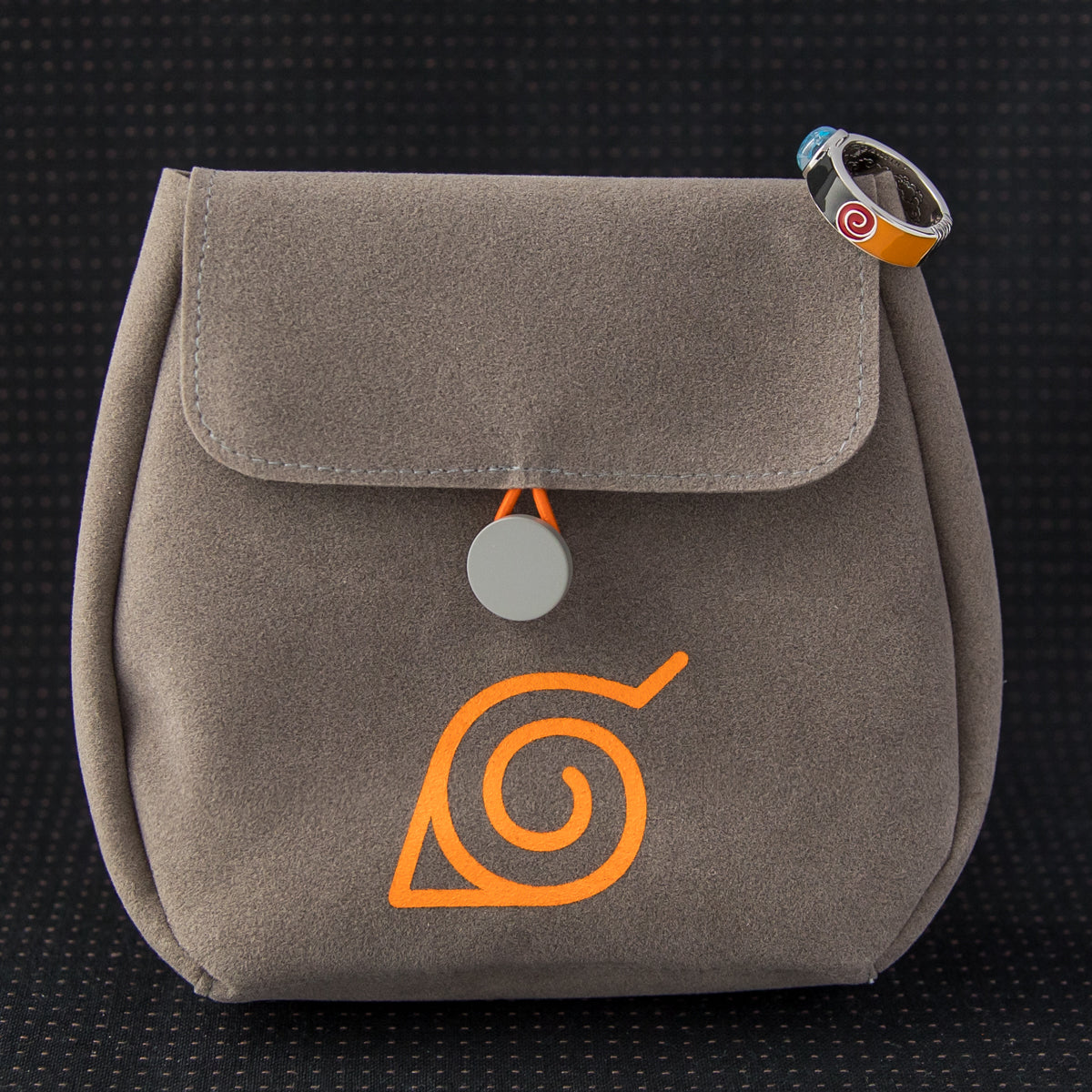 The ring mounted securely on the sleek black branded backer card inside its collector packaging