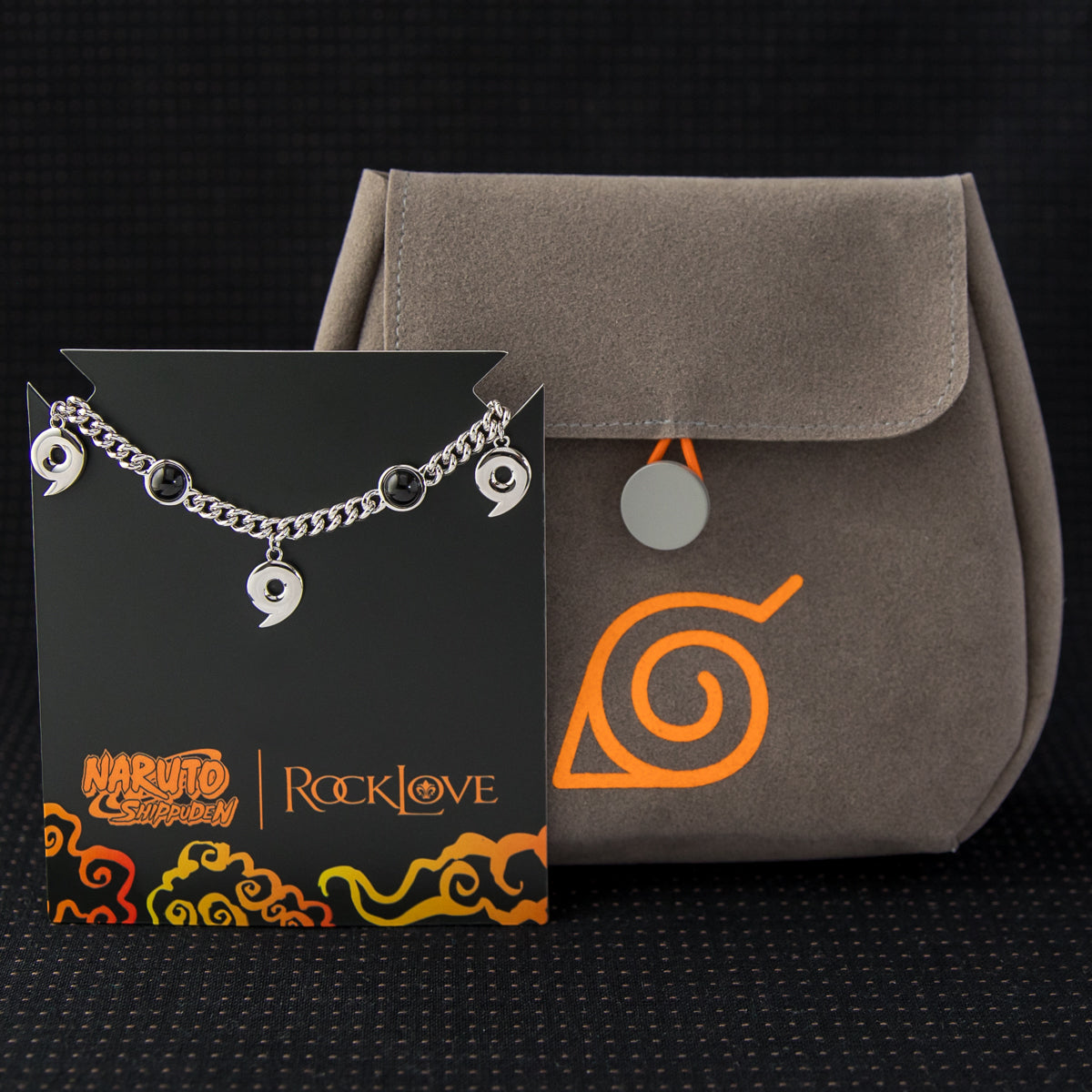 The branded suede pouch with Hidden Leaf Village symbol and black backer card