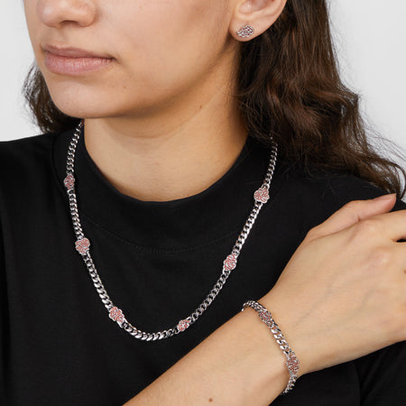 Close-up of the Akatsuki cloud link bracelet featuring red cubic zirconia crystals and white rhodium finish