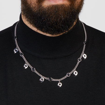 Close-up of the silver Six Paths Sage Mode pendant with cubic zirconia crystals