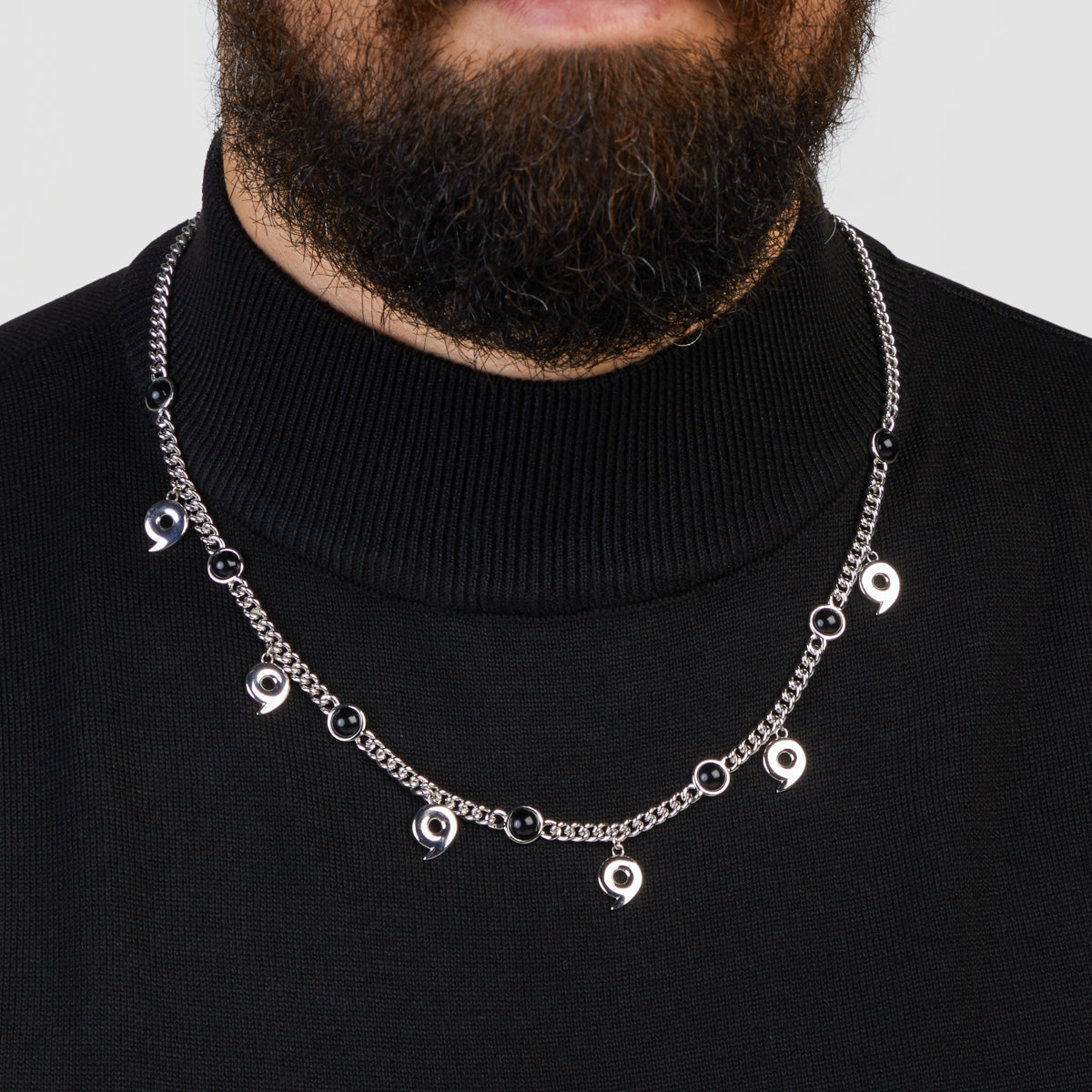 Close-up of the silver Six Paths Sage Mode pendant with cubic zirconia crystals
