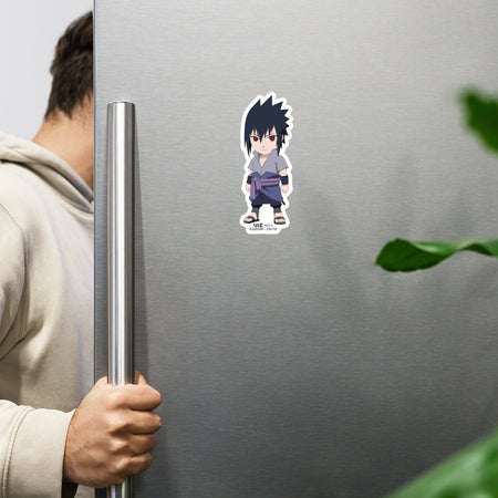 Close up angle of the Sasuke chibi matte vinyl magnet showing the die cut border and details